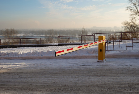 Vehicle security barrier on parking in winterの写真素材