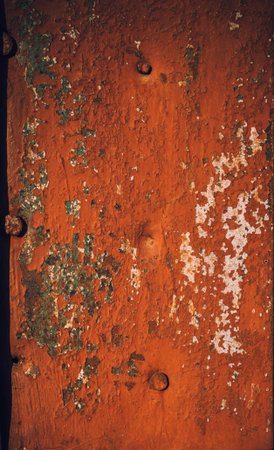 The flat metal surface painted in orange