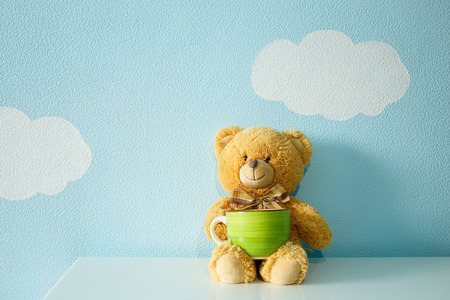 Bear toy with mugの写真素材