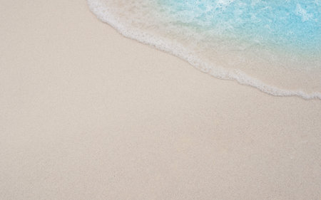 Tropical beach with white sand and turquoise ocean wave