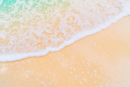 Soft wave of the sea on the sandy beach background - Boost up color Processingの写真素材