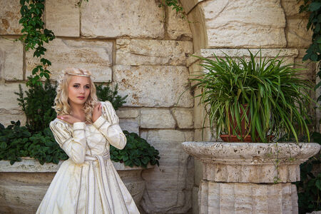  Beautiful woman in vintage dress on natureの写真素材