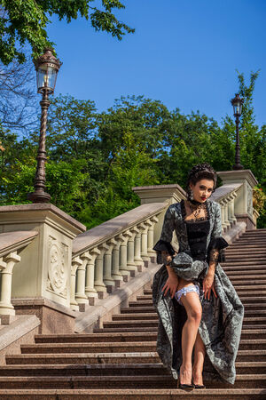 Beautiful woman in vintage dress on natureの写真素材