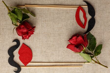 False mustaches and lips on a linen backgroundの写真素材