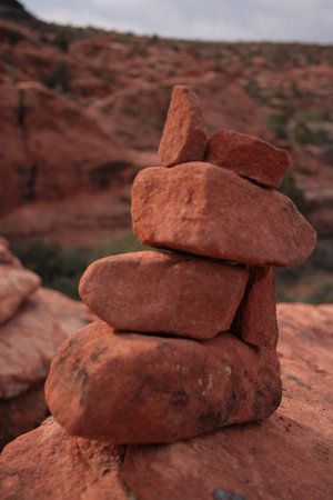 Rocks pilled to give direction to hikers. の写真素材