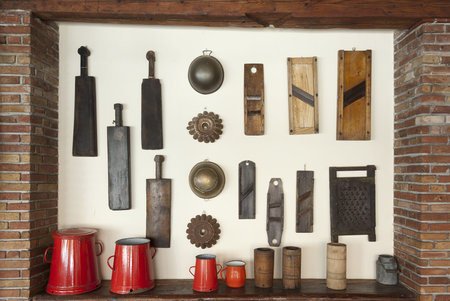 Old-time household items hanging on the wall