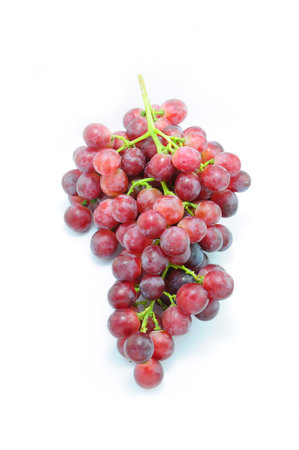 red grapes isolated on white backgroundの写真素材