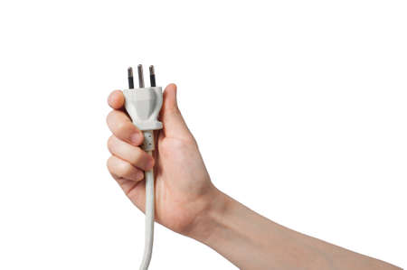 right hand holding electricity wire on white background.の写真素材