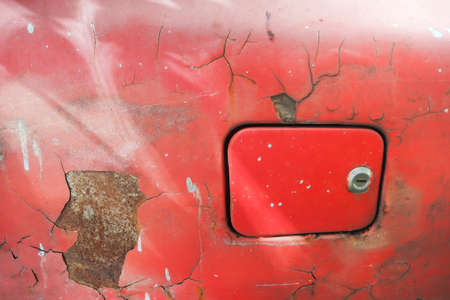 The Paint is peeling off the surface,  Old automotive part.の写真素材