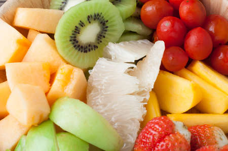 group of colorful variety fruits salad, healthy eating and dieting food, concept of health care,  Image focus top view.の写真素材