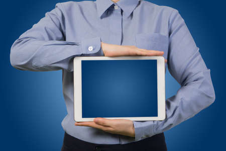 businessman holding gradient blue screen on smart phone, tablet, cell phone with blue background, businessman show the formation data concept.の写真素材