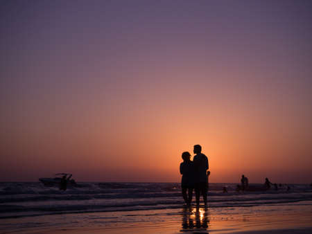 CHONBURI- April 23 : silhouette shadow of couple in love walking on beach with sunset. concept of holiday beach., holiday in Thailand on April 23, 2017 in Chonburi, Thailand.のeditorial素材