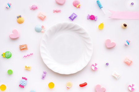 sweet candy frame on isolated white background, valentines day background. top view.