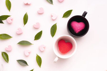 couple cup in love on white background, valentines day background, top view.の写真素材