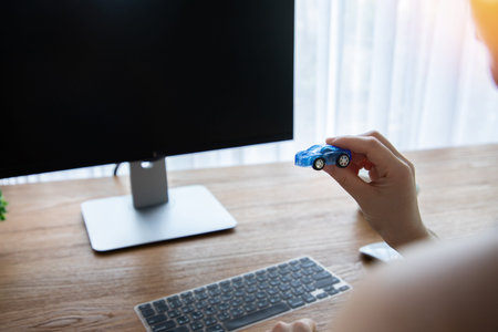 Concept of businessman using computer buying, rent a car.
