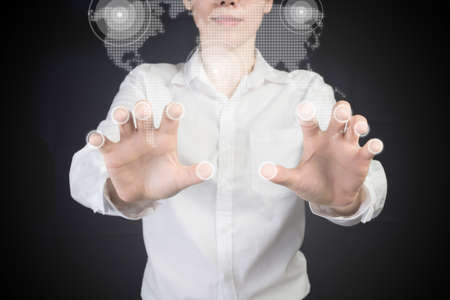 businesswoman pointing finger on virtual map control, concept of e-commerce marketing online.の写真素材