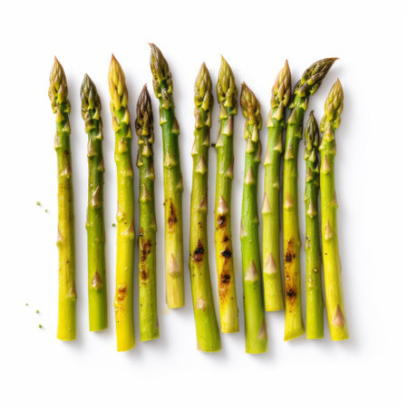 Fresh green asparagus isolated on white background. Top view.の素材