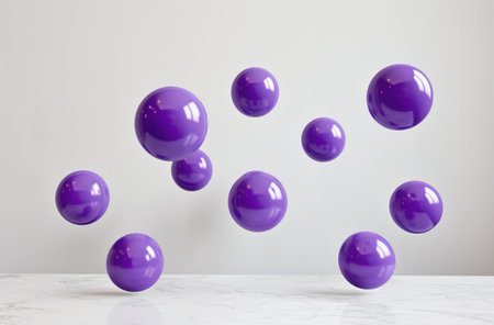 Floating purple balls against white wallの素材