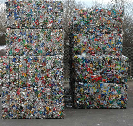 Bales of cans waiting to be recycled at recycling plantのeditorial素材