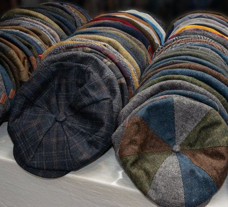 Caps for sale on a market stallの写真素材