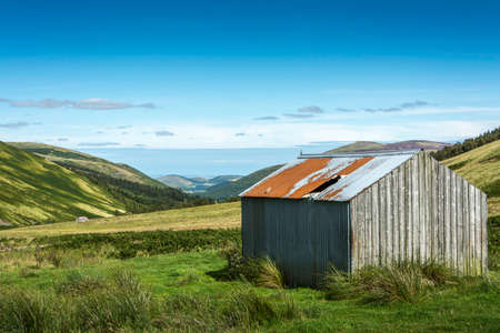 Two cow shelters in College Valley North in Summerの写真素材