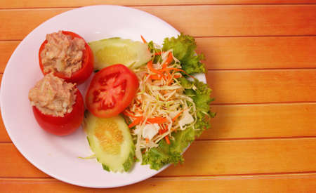tuna salad set on a wood table topの写真素材