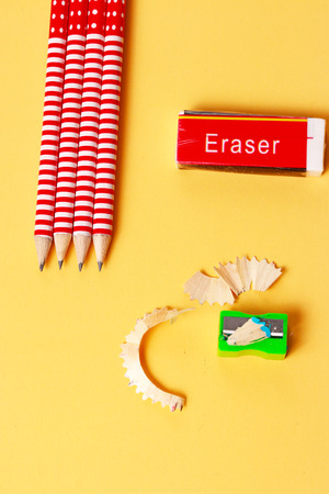 a display of eraser pencils and sharpenerの写真素材