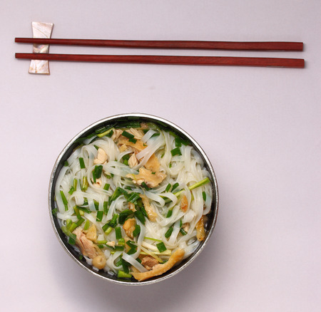 Hanoi pho chicken noodle soup on a white backgroundの写真素材