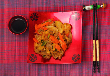 beef stir fry with ginger Vietnam style on a bamboo place matの写真素材