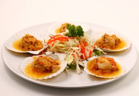 baked shellfish with a white backgroundの写真素材
