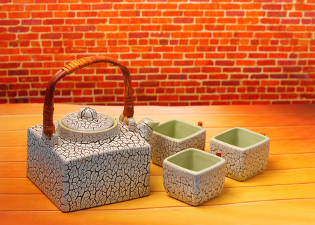 Asian tea set served on a wood table topの写真素材