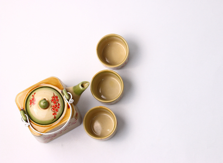 Asian tea set served on a white backgroundの写真素材