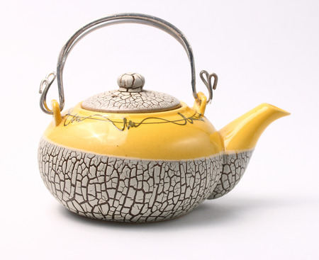 Asian style tea pot served on a white backgroundの写真素材