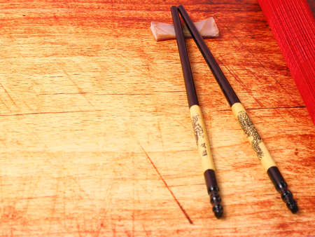 Traditional Vietnam table setting with chopsticks on a wood table topの写真素材