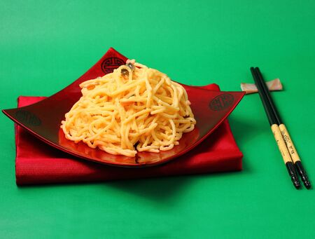 spaghetti  carbonara served on a green blackgroundの写真素材