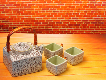 Asian tea set served on a wood table topの写真素材