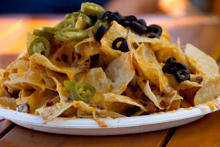 Plate of Hot Nachos served at an outdoor restaurauntの写真素材