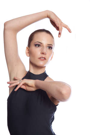 Ballet Dancer framing her face with hands and armsの写真素材