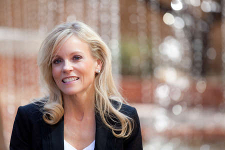 Pretty Smiling Blond Businesswomanの写真素材