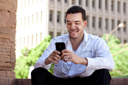 Good Looking Guy in his twenties Textingの写真素材
