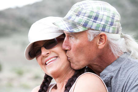 Middle Aged Happy Romantic Couple outside in the summerの写真素材