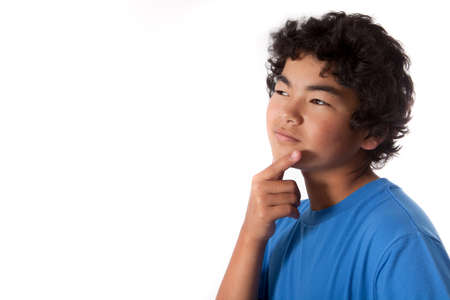 Asian Teenager thinking isolated on white for copy spaceの写真素材