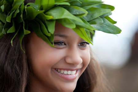 Pretty Hula Girl wearing a handmade Polynesian head pieceの写真素材