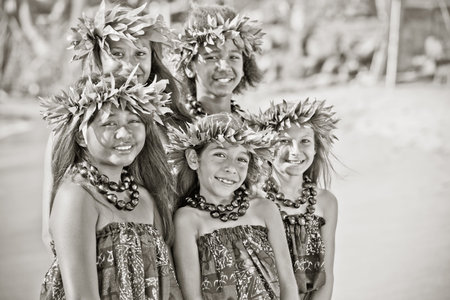 Hula girls on the beach in Black and white textured grain photo for aging effectの写真素材