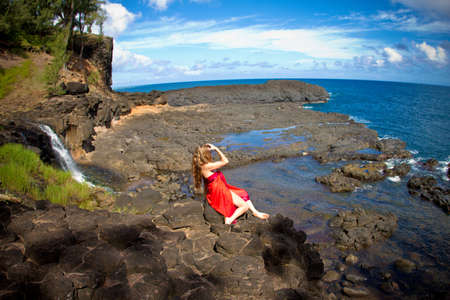 Pretty Woman in Paradise on a secluded Beach shot with a fish eyeの写真素材