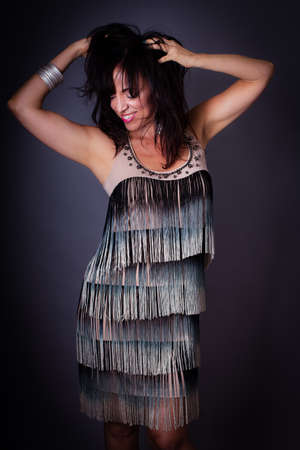 Beautiful woman in a Gorgeous Dress studio shotの写真素材