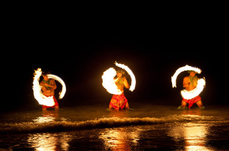 Three Strong Men Juggling Fire in Hawaii - Fire Dancers