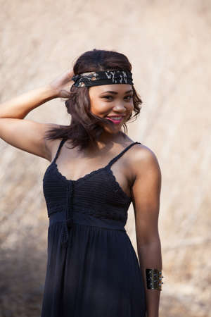 Beautiful mixed race young woman in natureの写真素材