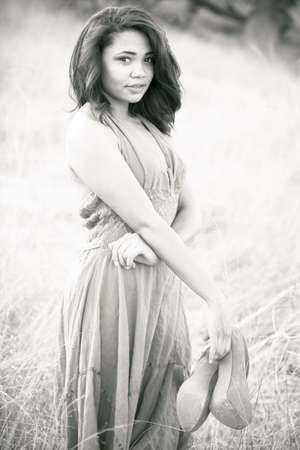 Beautiful mixed race young woman in natureの写真素材