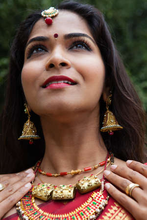 Beautiful Indian Bride in Cathedral Hallway on her wedding dayの写真素材